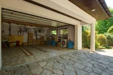 A garage with a bike rack and a bike parked