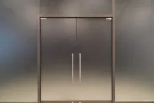 A spacious metal door with two panels