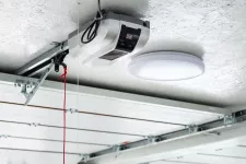 Garage door opener installed on garage ceiling