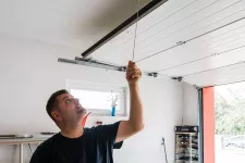 Garage door adjusting by professional