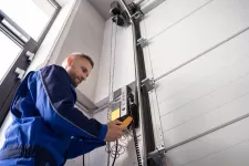 Installer configuring a garage door opener