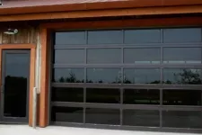 Transparent garage door with black frame