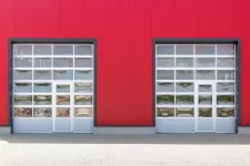 A red building with glass garage doors