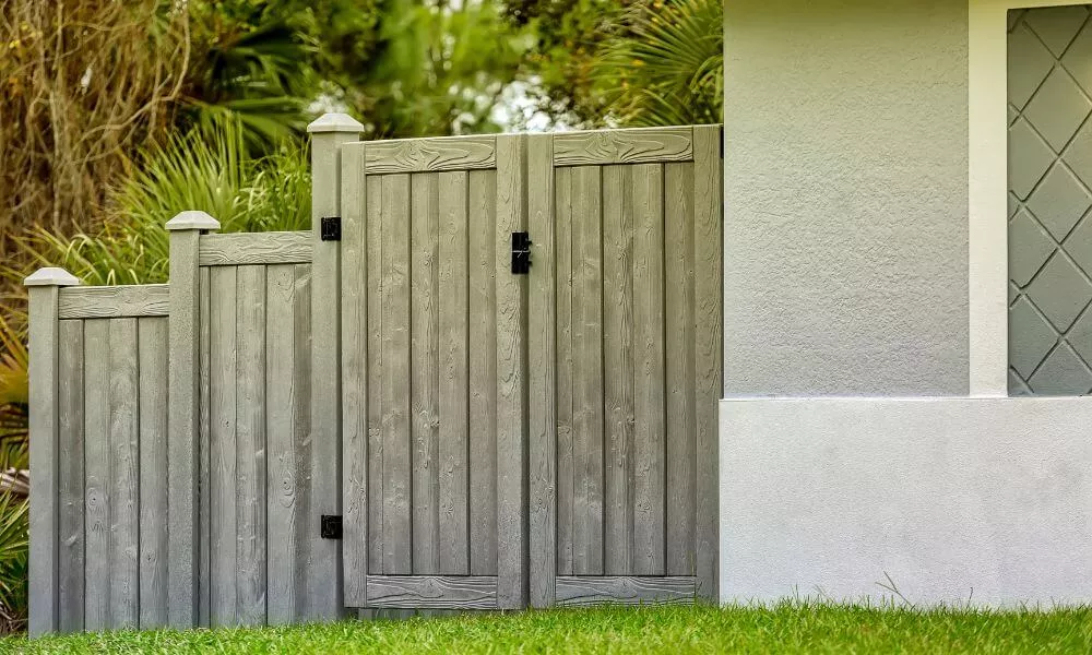 A house with a fence and gate, creating a charming entrance