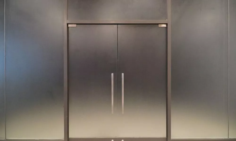 A spacious metal door with two panels