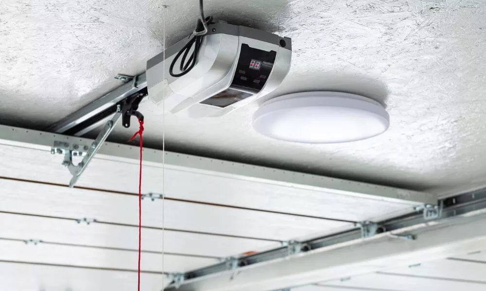 Garage door opener installed on garage ceiling