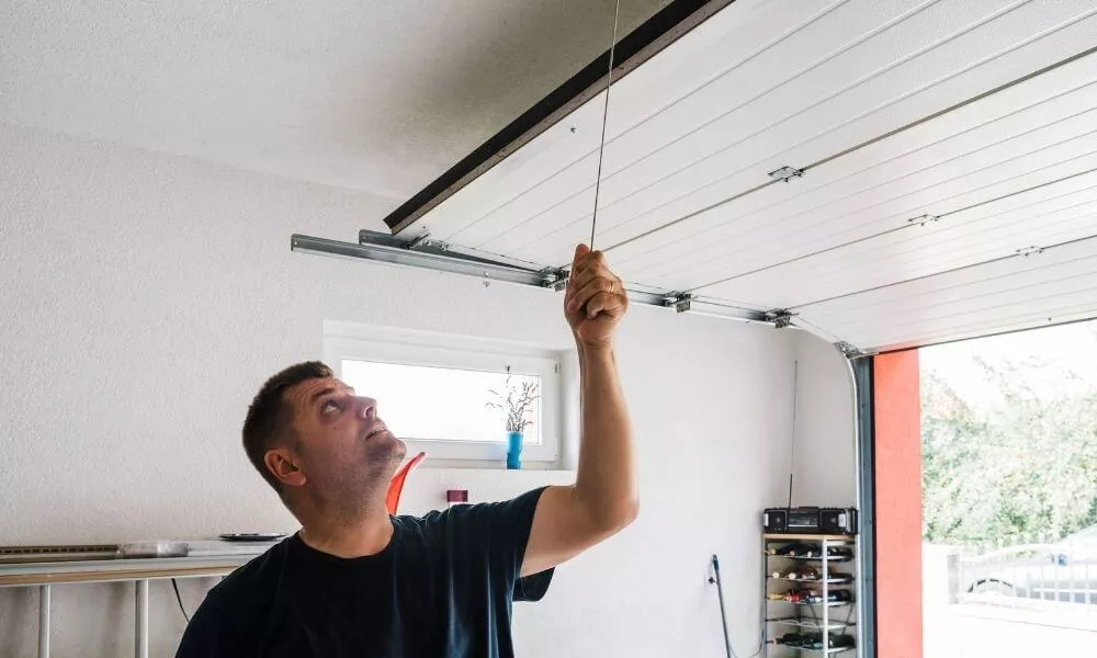 Garage door adjusting by professional