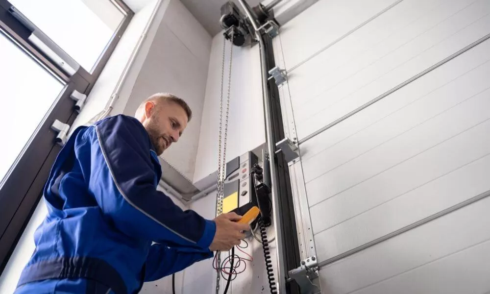 Installer configuring a garage door opener