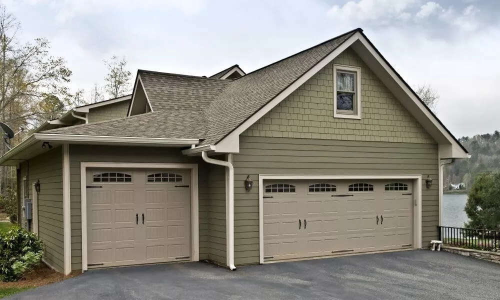 Garage with 2 beige garage doors
