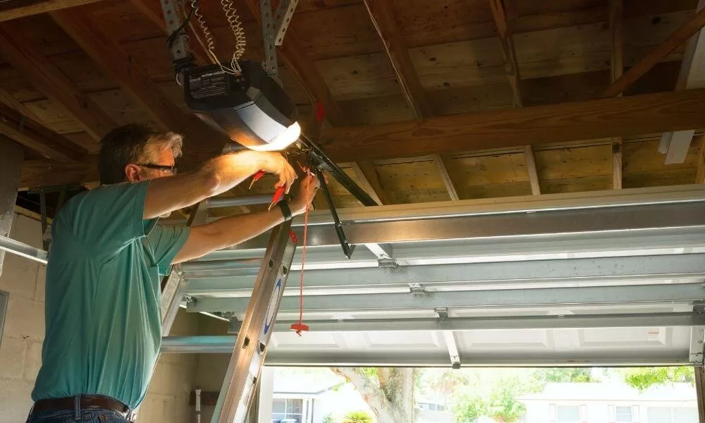 Professional who installs and secures a door opener
