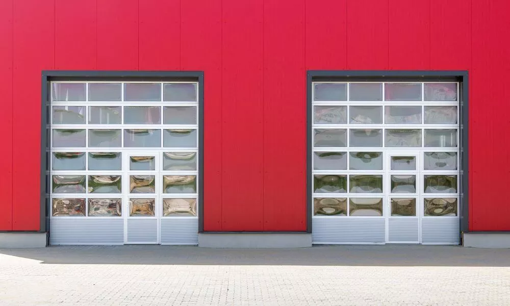 A red building with glass garage doors