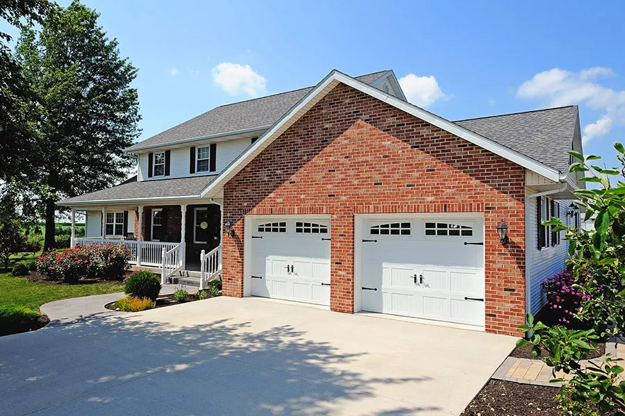 Brick house with two garage doors